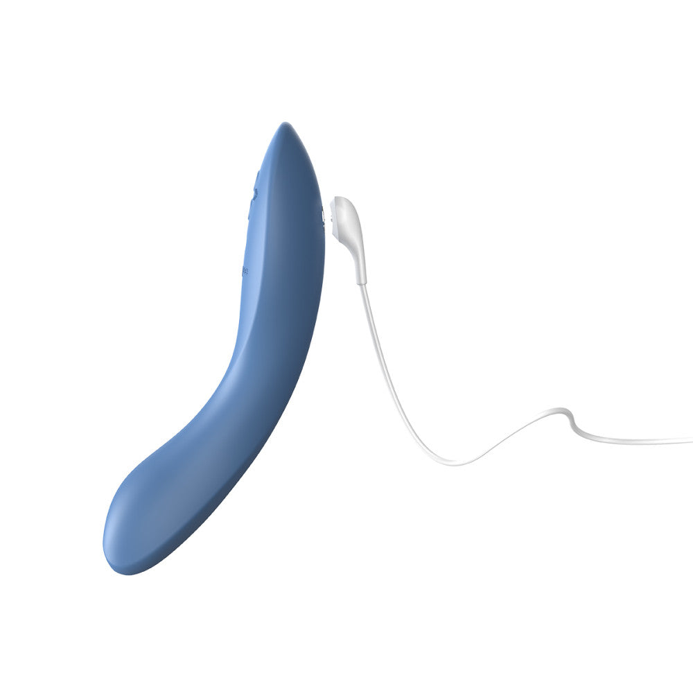 8 inch blue g-spot vibrator with a magnetically rechargeable cord, showing how to charge the toy