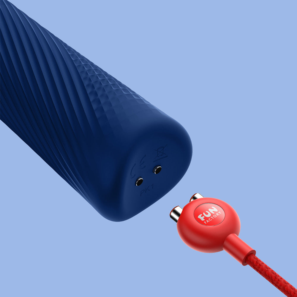 close up of the magnetic charging port and charger head