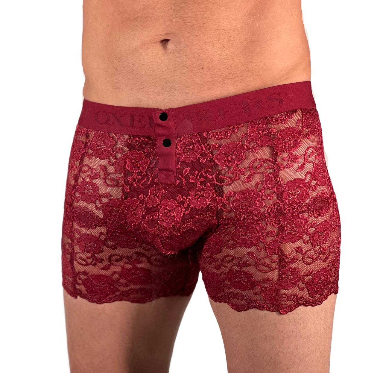 white male model with bulge is wearing black cherry red lace boxers with two front snaps and a thick matching red waistband